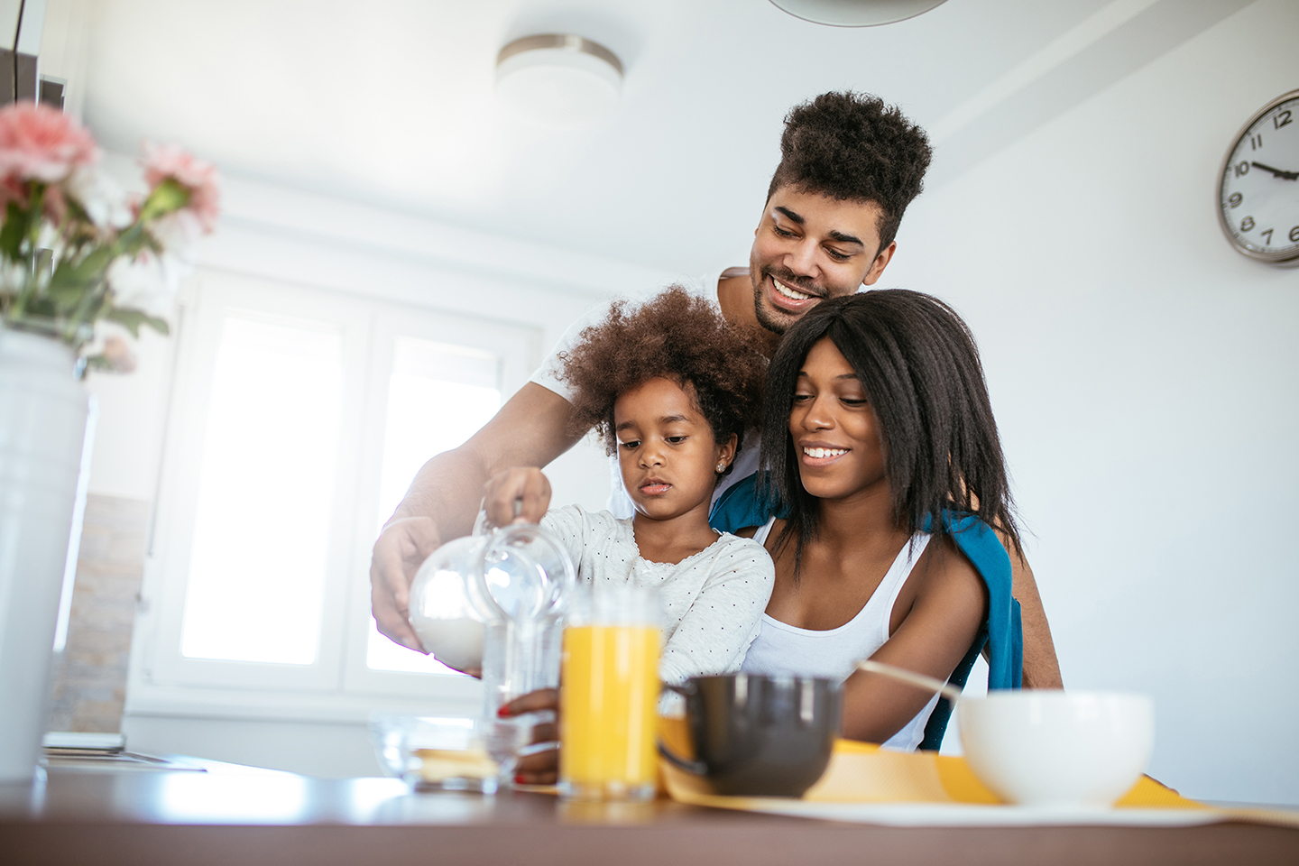 photo of a family having breakfast together